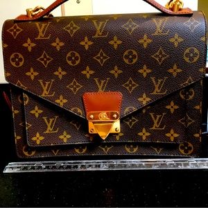 Nearly new authentic Louis Vuitton women’s briefcase. With shoulder strap.